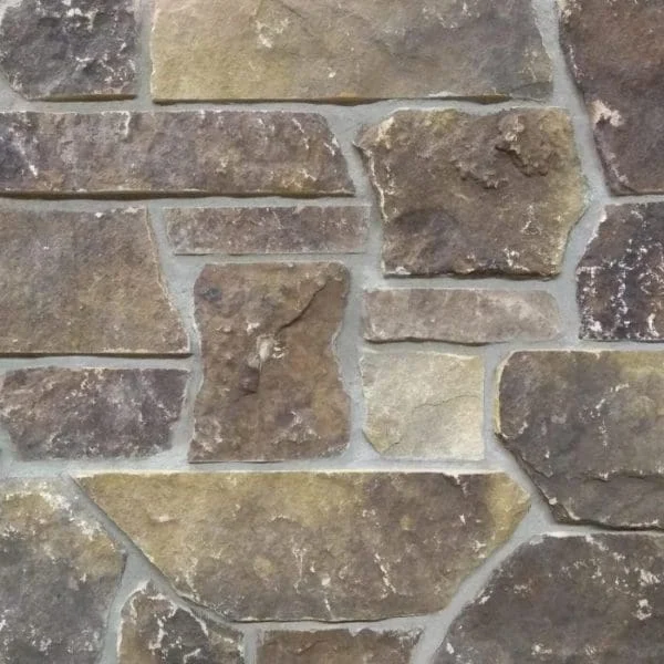mock up of brown natural stone veneer sawn on the top and bottom