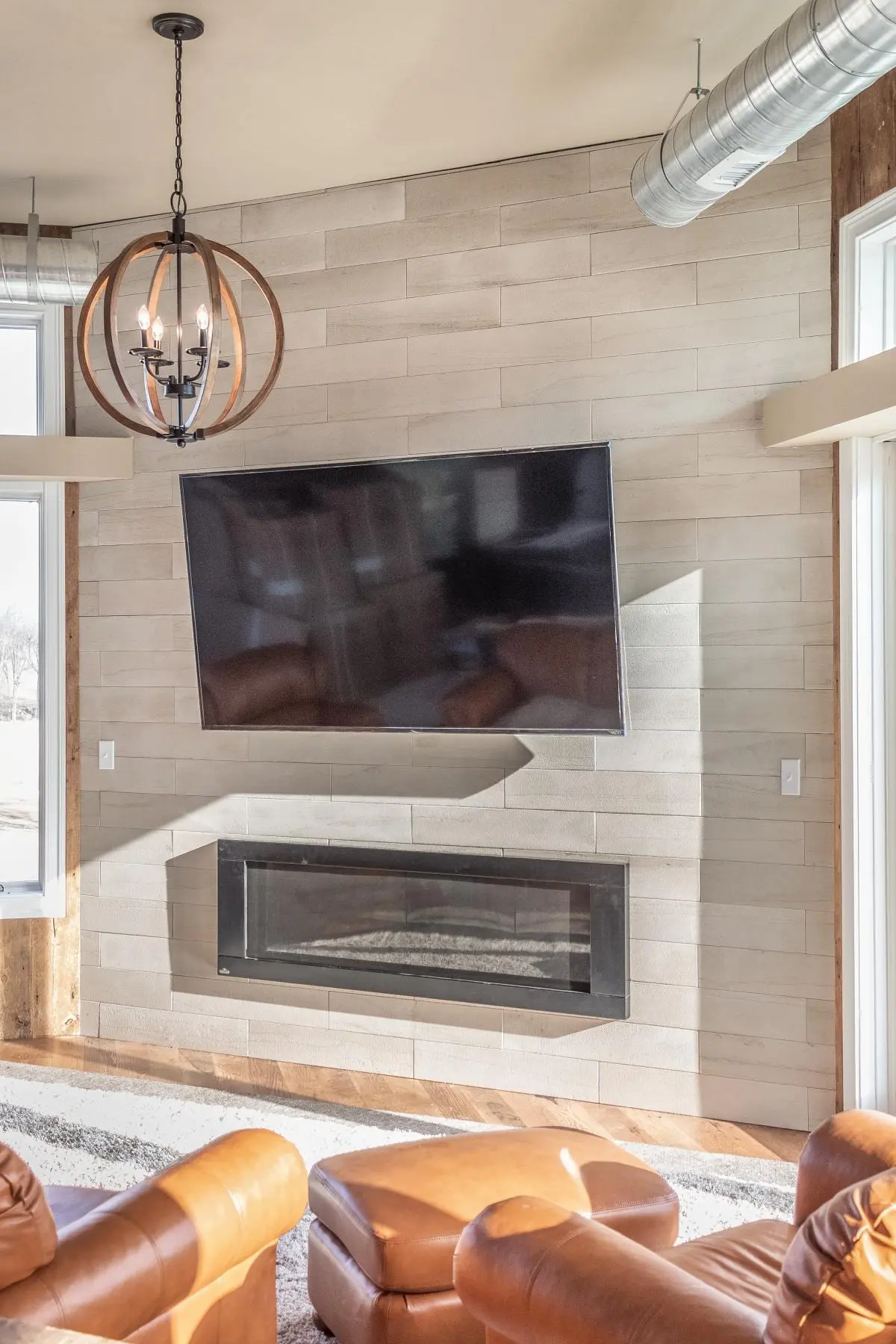 Large white thin stone panels installed on an interior wall.