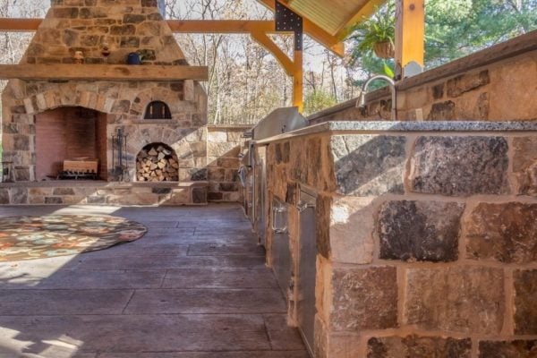 Close-Up of London Thin Stone Veneer Outdoor Kitchen and Fireplace