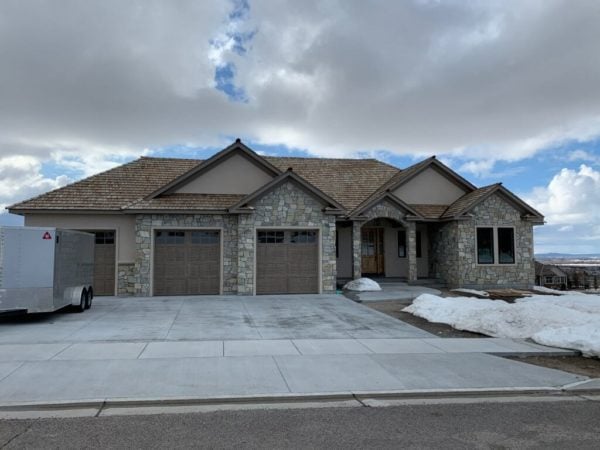 Curb View of Residential Home with Olympia Ashlar Style Stone