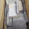 A stock crate of natural stone veneer corners