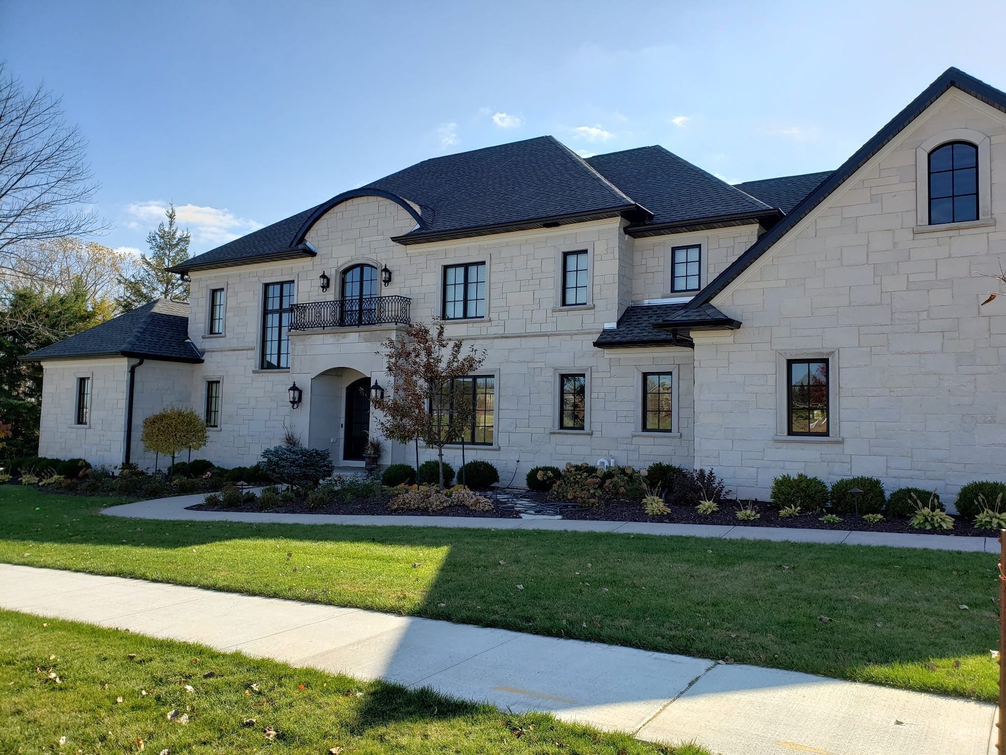 Curb View of Home with Alpine Real Thin Stone Veneer
