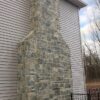 Chimney with Emerald Bay Natural Stone Veneer