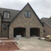 Garage with Helmsdale Real Thin Stone Veneer Siding