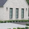 Exterior Siding with Montreux White Natural Stone Veneer