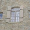 Close up home exterior with chateau real stone veneer