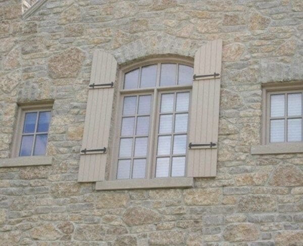 Close up home exterior with chateau real stone veneer