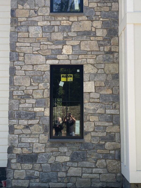 Exterior accent wall with custom blend of Balkan and Jura real stone veneer