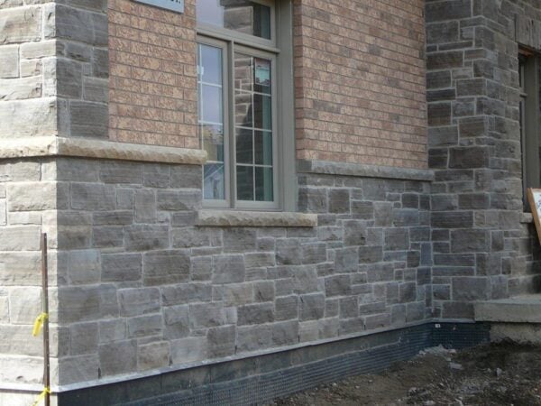 Brick and stone home exterior with Jodeco real stone veneer