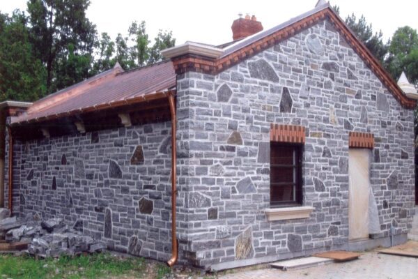 Home Exterior with Timmins Natural Thin Stone Veneer