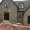 Home exterior installation with Helmsdale real thin stone veneer