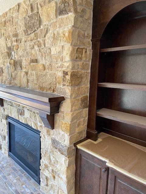 Side view of interior fireplace with Mojave real stone veneer