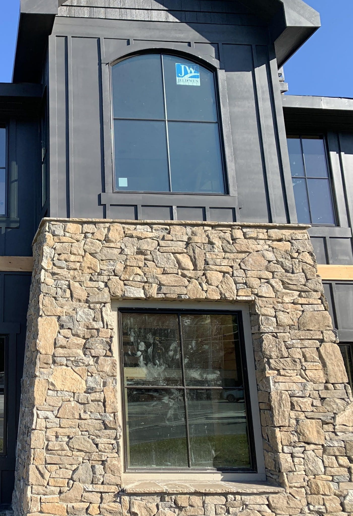 Home exterior with Pinedale real thin stone veneer drystack installation