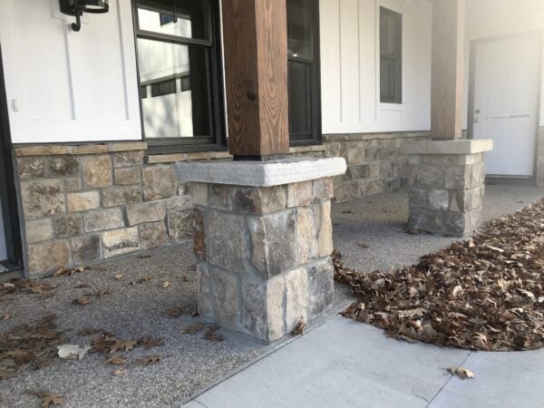 Exterior wainscoting and pillars with Whistler real stone veneer