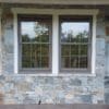 Covered patio exterior wall with Bayside and Augusta real thin stone veneer