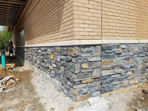 Exterior wainscoting with Brunswick real ledgestone veneer