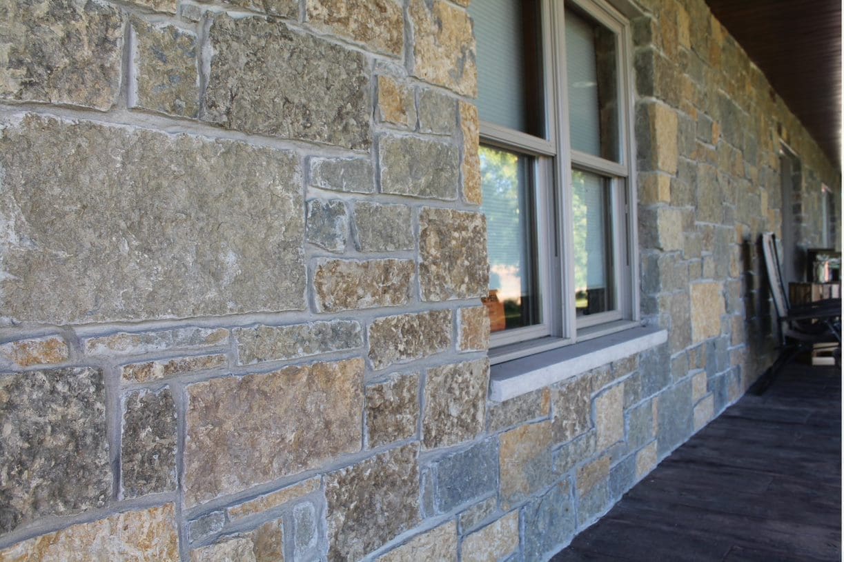 Castle Ridge and Baltic Hills Natural Stone Veneer Blend Covered Front Porch