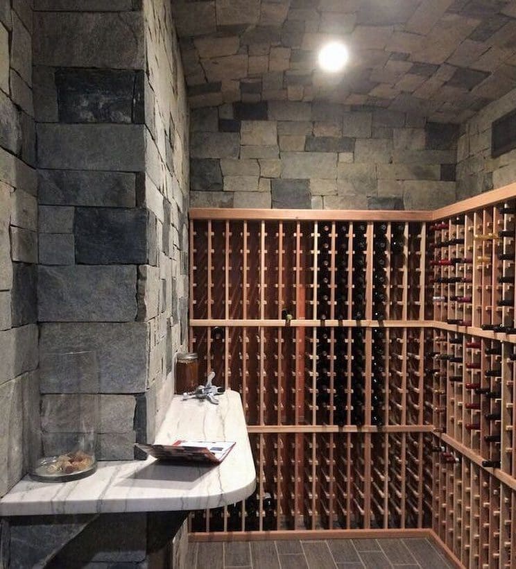 Wine Cellar with Charleston natural thin stone veneer walls