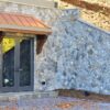 Exterior landscape wall with Cheyenne real thin stone veneer