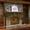 Living room interior walls and fireplace with Coventry natural stone veneer