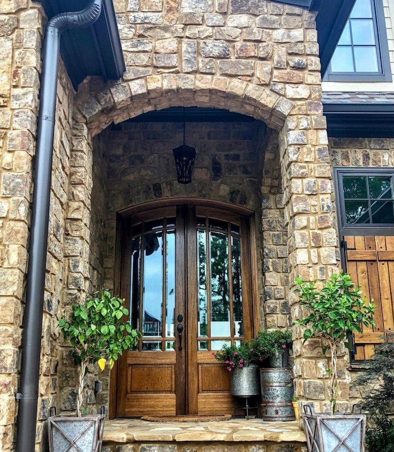Front entrance with Dakota ashlar natural thin stone veneer with tan mortar