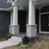Front porch with Fond du Lac real thin stone veneer pillars