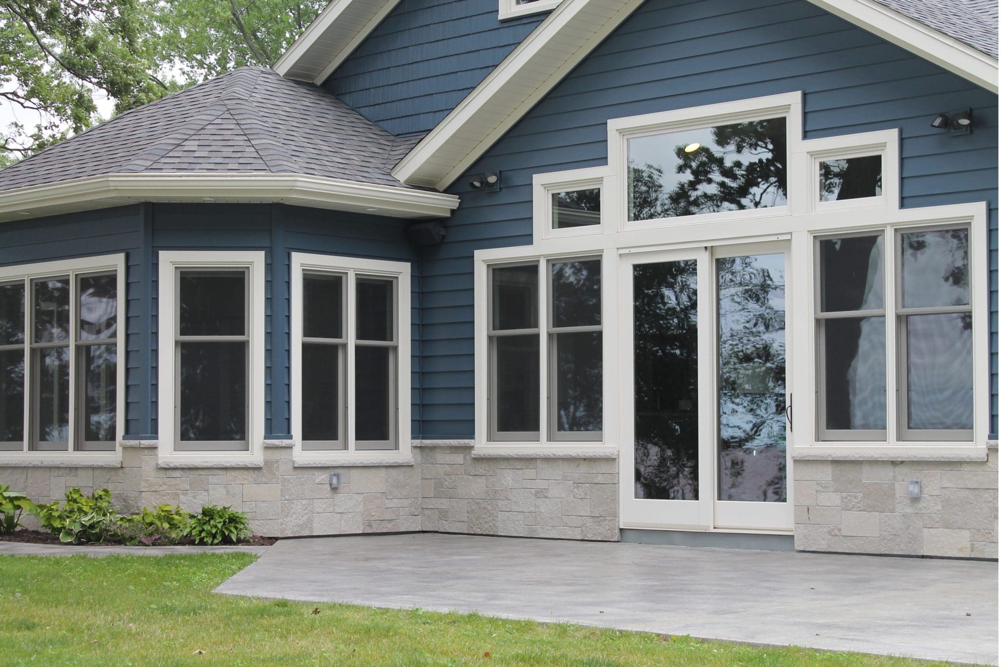Exterior wainscoting with Fond du Lac natural stone veneer