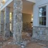 Wainscoting and pillars with Foxborough natural thin stone veneer