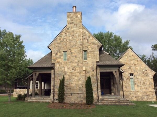 Exterior siding with Hudson ashlar real stone veneer