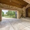 Luxury porte-cochère front entrance with Newcastle dimensional natural stone veneer