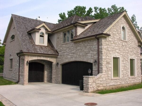 Garage with Promenade ashlar style real stone veneeer