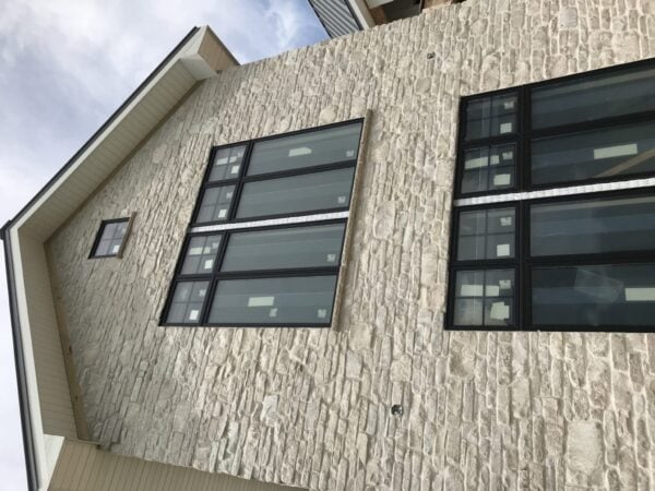 Exterior with Promenade natural thin stone veneer