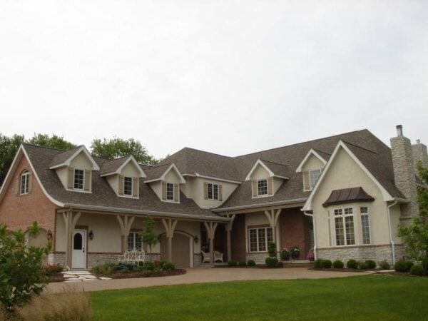 Exterior with Promenade tumbled natural thin stone veneer