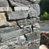 Close-up drystack masonry with Quincy natural stone veneer