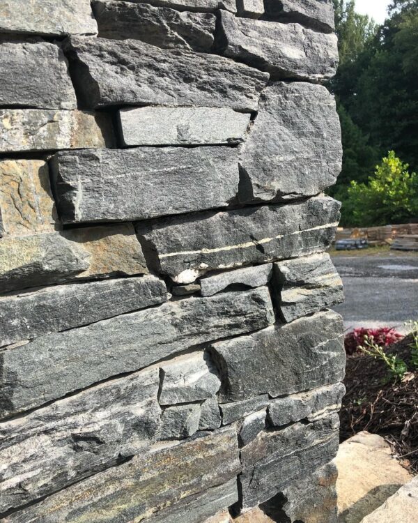 Close-up drystack masonry with Quincy natural stone veneer