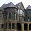 Home exterior with Richmond, Carlisle, and Shadow Vista natural stone veneer
