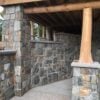 Covered patio with Rochester castle rock style real thin stone veneer