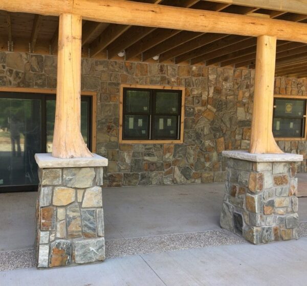 Covered patio with Rochester castle rock style real thin stone veneer