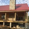 Log cabin siding with Rochester real thin stone veneer