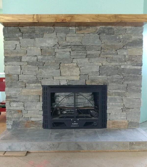 Interior gas fireplace with Sheffield natural stone veneer