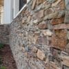 Drystack exterior wall with Tucson natural stone veneer