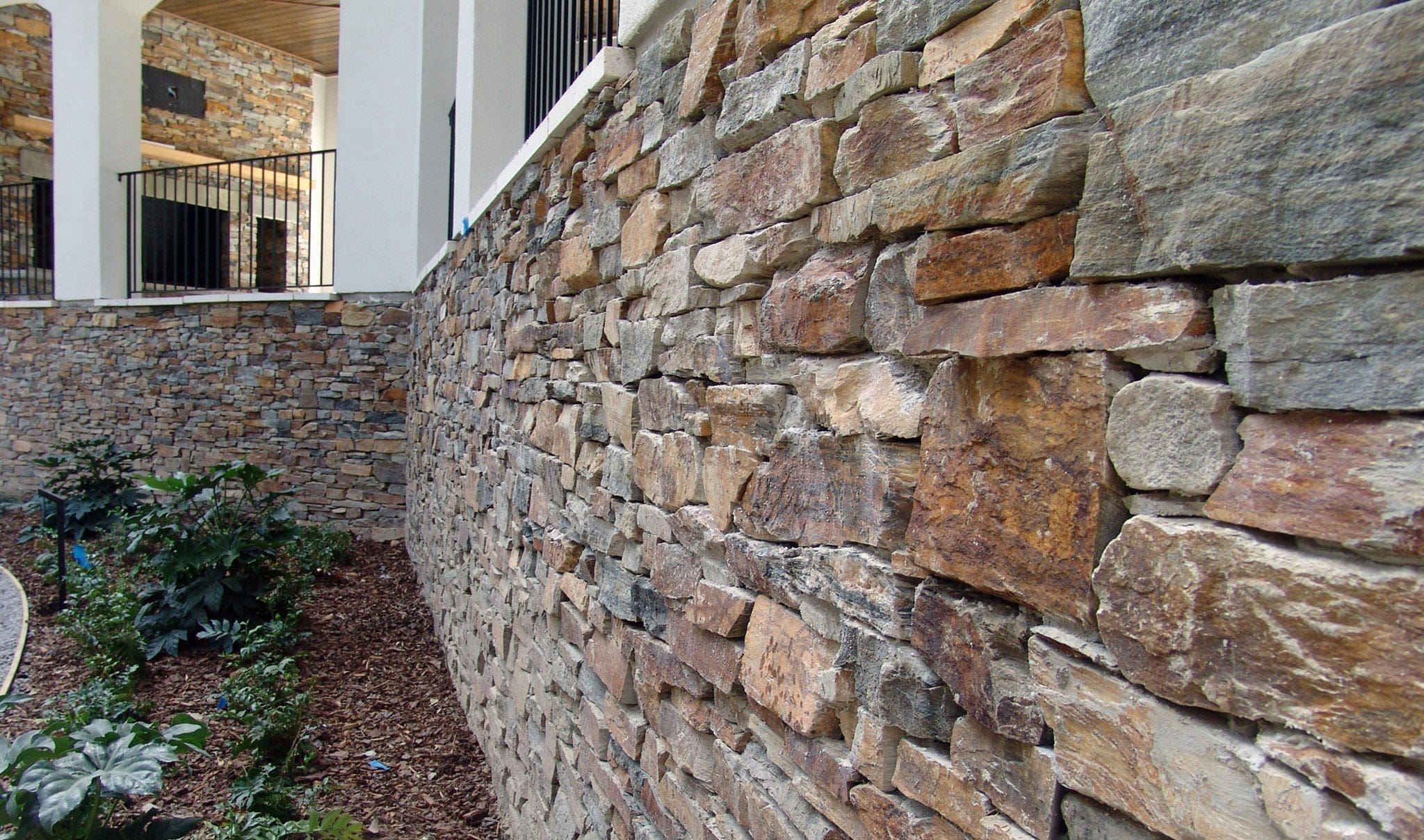 Drystack exterior wall with Tucson natural stone veneer