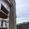 Chimney installation with Vineyard natural stone veneer