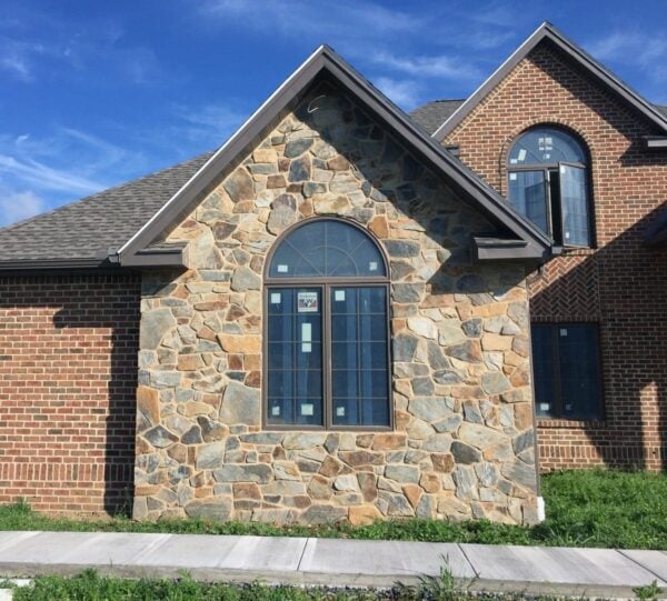 Exterior accent wall with Bonavista mosaic natural stone veneer