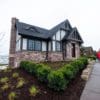 Lakehouse with Cherrywood natural thin stone veneer exterior