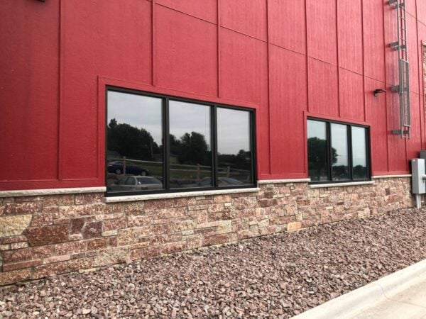 Commercial exterior wainscoting with Cherrywood natural stone veneer