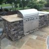 Outdoor grill with Feldberg real thin stone veneer