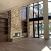 Interior floor to ceiling fireplace with Door County Ledge natural stone veneer