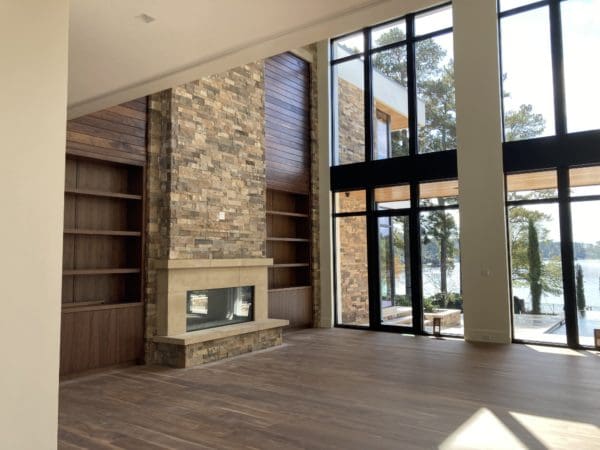Interior floor to ceiling fireplace with Door County Ledge natural stone veneer