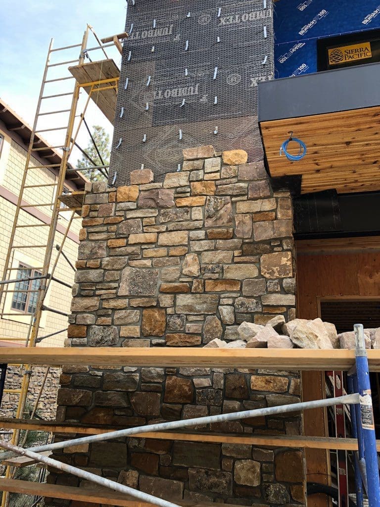 Stone installation in progress with Vail real thin veneer